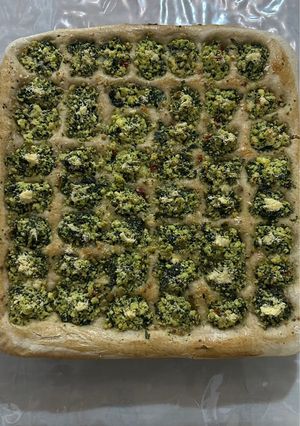 Una foto de Pizza de espinaca y ricota inspirada en reel de la cubetera de hielo