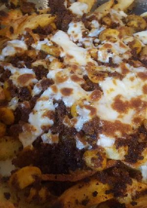 صورة لوصفة ودجز بطاطا مع الجبنة والسجق