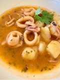Calamari su crema di patate
