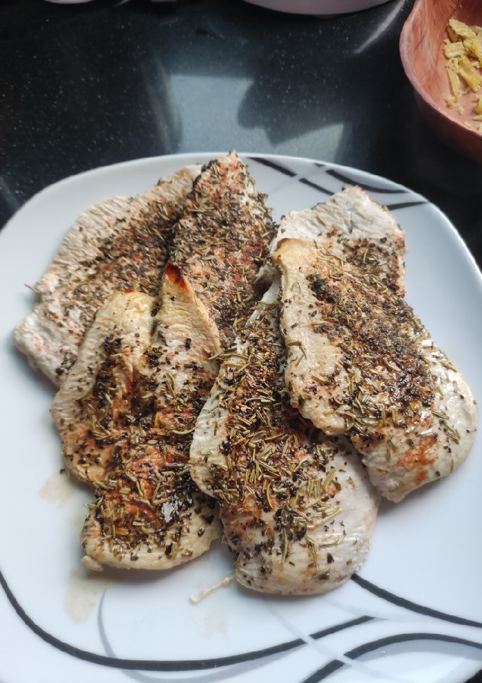 Una foto de Pechuga de pollo en papel de horno