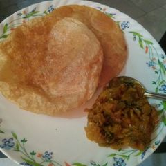 Petha bhaji with poori A picture of Petha bhaji with poori.