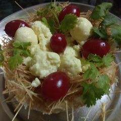 A picture of #festivesavouries Bird's Nest Chena Pieces.
