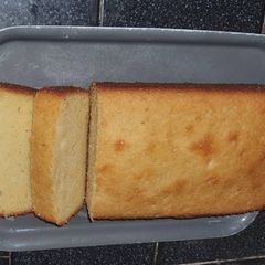 A picture of Lemon Pound Cake with a Simple Lemon Glaze.
