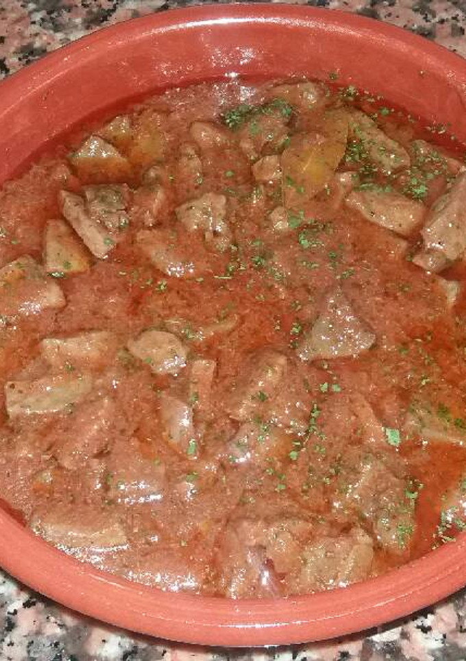 Una foto de Hígado de cerdo encebollado