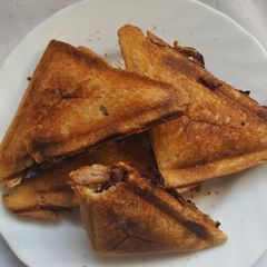 A picture of Sausage onion stuffed toasted bread.