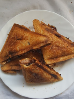 A picture of Sausage onion stuffed toasted bread.