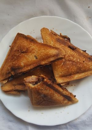 A picture of Sausage onion stuffed toasted bread.