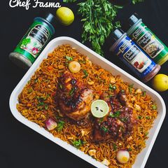 A picture of Chinese fried rice with lemon peppered chicken.