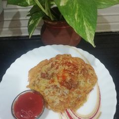 A picture of Crispy Potato Lachha Chilla.