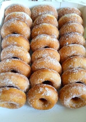 A picture of Sugar coated ring doughnuts.