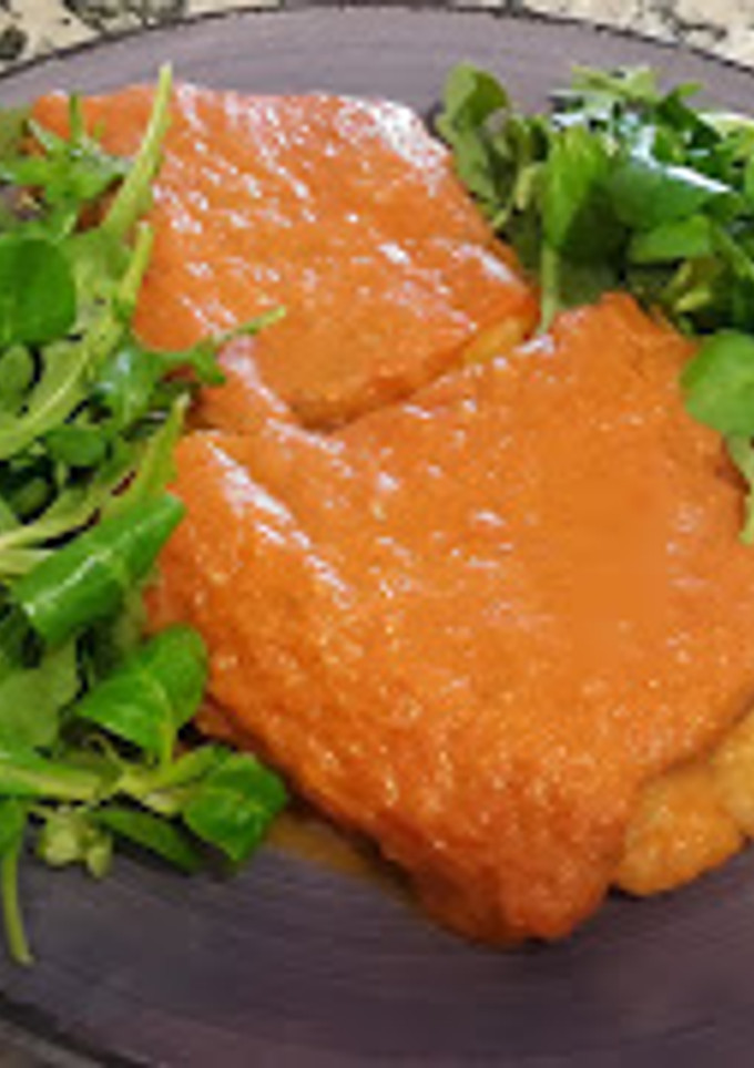 Una foto de Bacalao con tomate