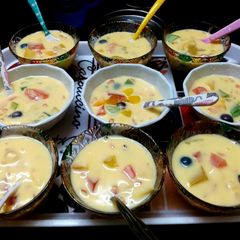 A picture of Fruits custard with jelly.