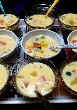 A picture of Fruits custard with jelly.