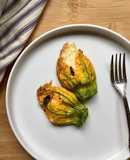 Baked stuffed courgettes blossoms