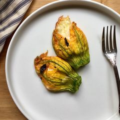 A picture of Baked stuffed courgettes blossoms.