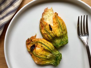 Baked stuffed courgettes blossoms