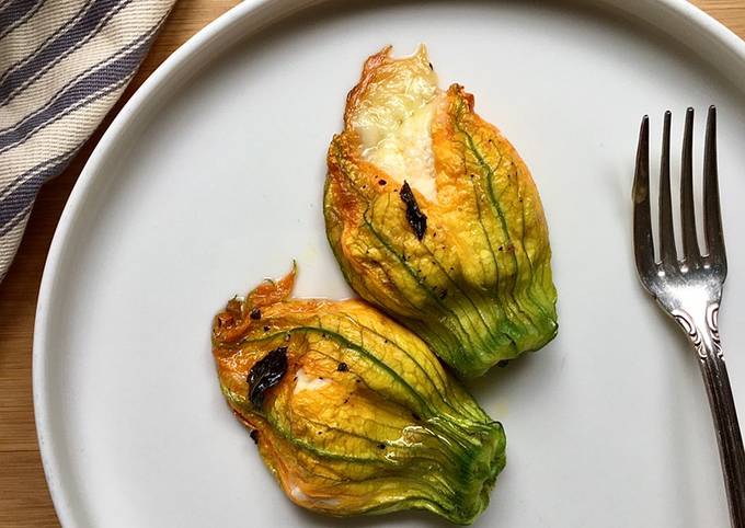 Baked stuffed courgettes blossoms