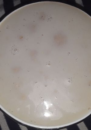 Una foto de Tibio de pinol o pinolillo con leche o Atole de pinol