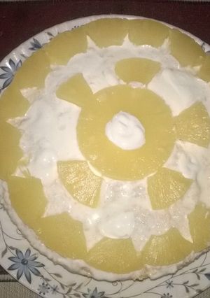 A picture of Pineapple cream cake in microwave.