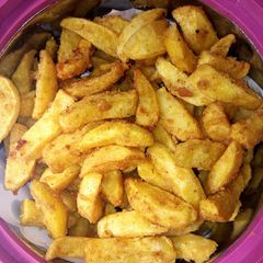 A picture of Potato wedges.