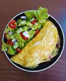 Omelette de champiñones y espinacas