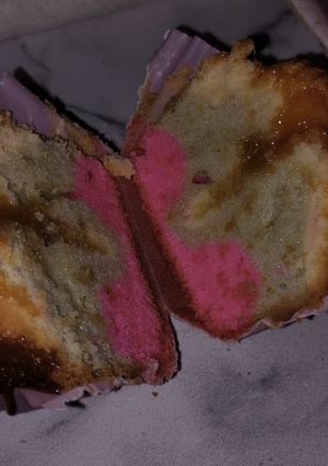 Una foto de Magdalenas con corazón de dulce de leche
