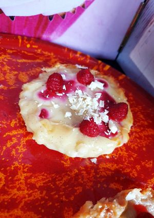 Une photo de Tartelettes au chocolat blanc framboises
