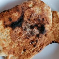 Naan bread A picture of Naan bread.