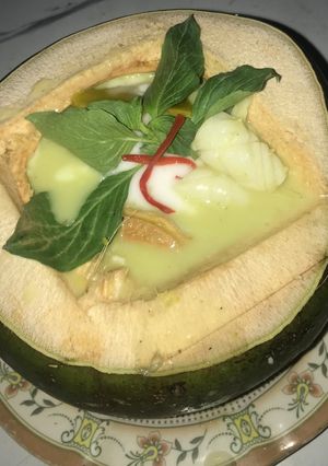 A picture of Green Curry Squid in Young Coconut.