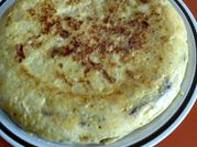 Una foto de patatas con cecina