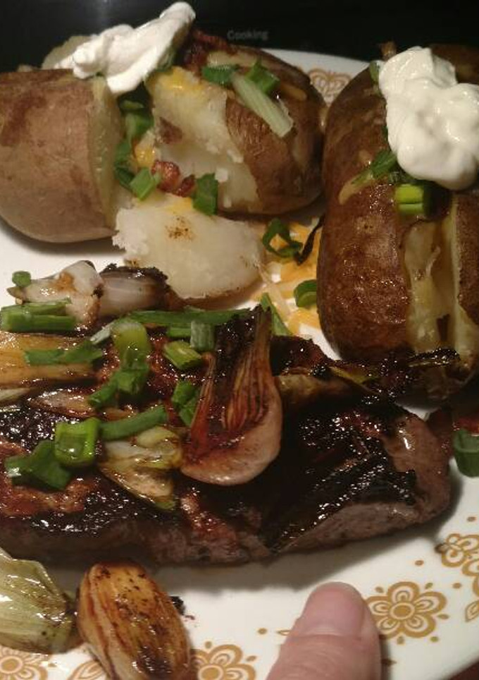 A picture of Spiced Ginger Steak with Spring Onions and Potatoes.