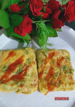 অমলেট র‍্যাপড টোস্ট (omelette wrapped toast recipe in Bengali) রেসিপির প্রধান ছবি