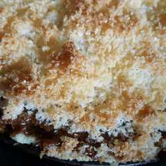 Una foto de Tarta de coco y dulce de leche sin tacc