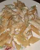 Fideos con queso Messonier al pesto
