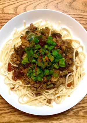 A picture of Noodles with Pork and Century Egg Sauce.