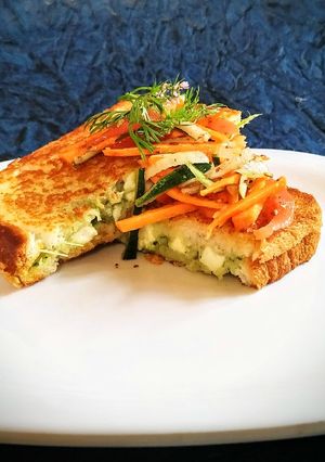 A picture of Quick Thai paneer sandwich with salad.