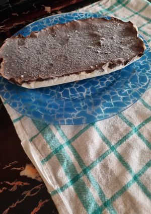 Una foto de Helado de yogurt griego con coco y chocolate