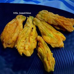 A picture of Kumro Phool Bora aka pumpkin flower fritter.