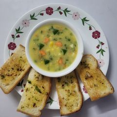 Sweet Corn Soup and Garlic Butter Toast A picture of Sweet Corn Soup and Garlic Butter Toast.