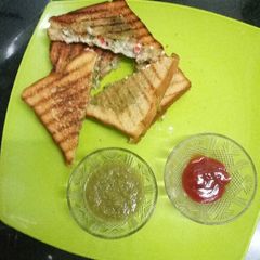 A picture of Capsicum onion grilled cheese sandwich.