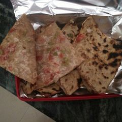 A picture of Pizza paratha.