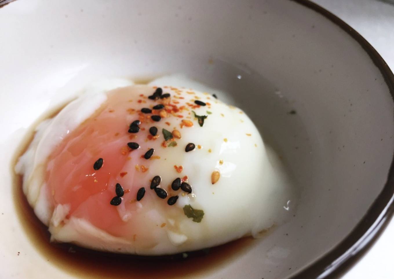 Sous vide poached egg with soy sauce and shichimi