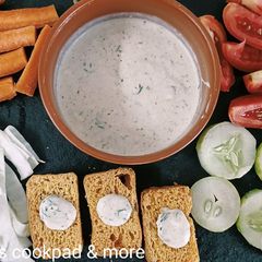 A picture of Homemade Ranch dressing with salad and rusk toast.