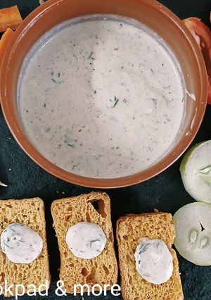 A picture of Homemade Ranch dressing with salad and rusk toast.
