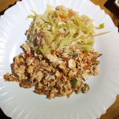 Scrambled eggs and fried cabbage A picture of Scrambled eggs and fried cabbage.