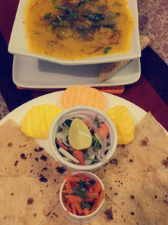 A picture of Daal masoor with baingan.
