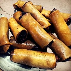 A picture of Chicken Adobo Lumpiang Shanghai.