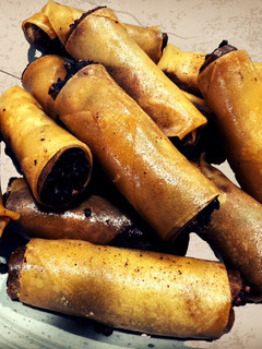 A picture of Chicken Adobo Lumpiang Shanghai.