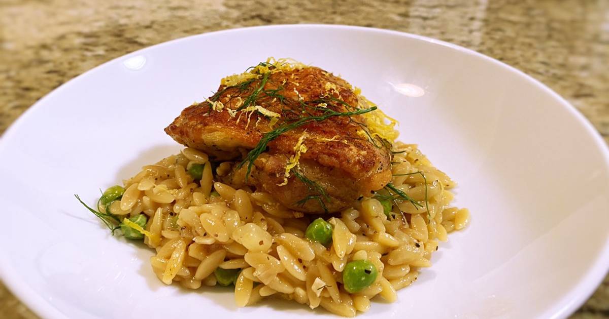 Crispy chicken thighs with lemon fennel and pea orzo Recipe by Chef