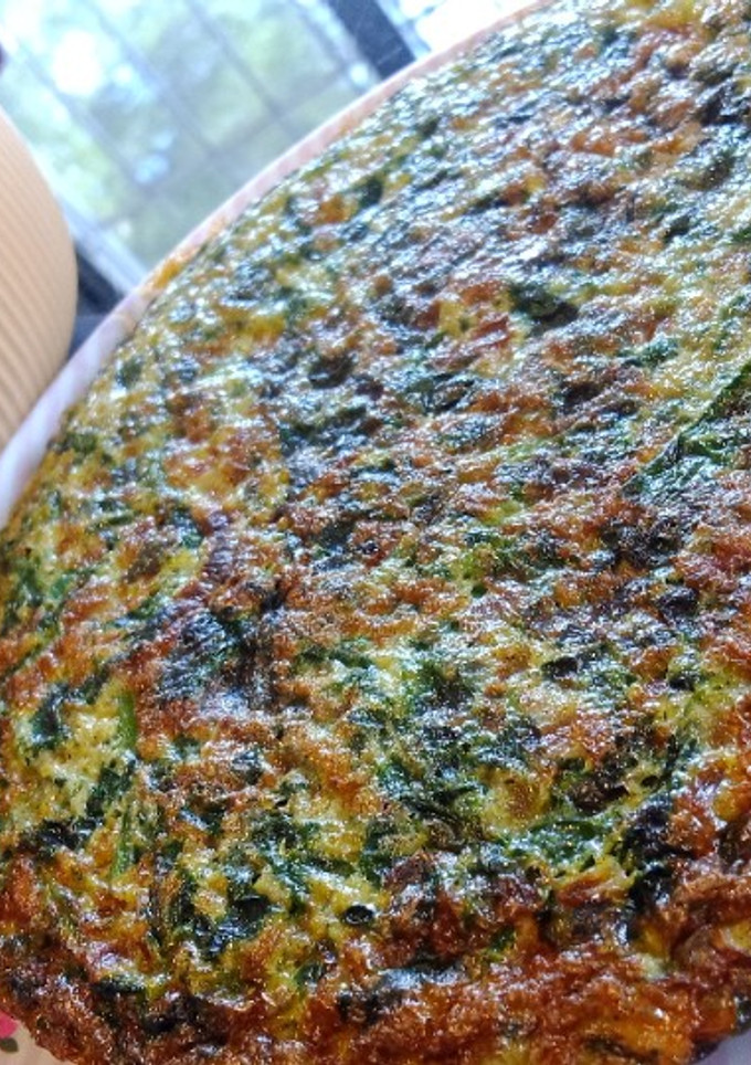 Una foto de Tortilla de espinacas y ajos tiernos